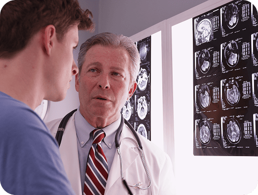 Doctor consulting brain injury patient