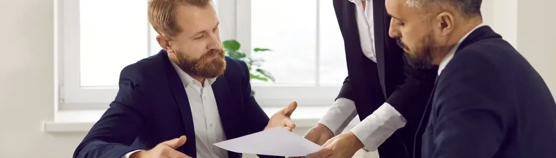 Two lawyers help explain personal injury law to man